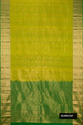 Parrot Green Dual Tone Kanchipuram Silk Saree with Zari Brocade on the body and Zari Border.  displayed on a mannequin