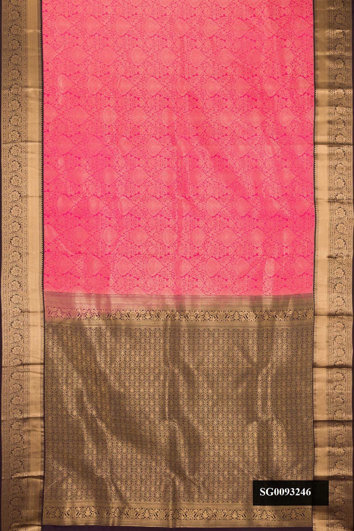 Pink Dual Tone Kanchipuram Silk Saree with Zari Brocade on the body and Zari Border.  displayed on a mannequin