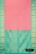 Pink Dual Tone Kanchipuram Silk Saree with Zari Brocade on the body and Zari Border.  displayed on a mannequin