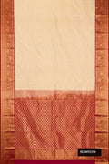 Sandal Dual Tone Kanchipuram Silk Saree with Zari Brocade on the body and Zari Border.  displayed on a mannequin