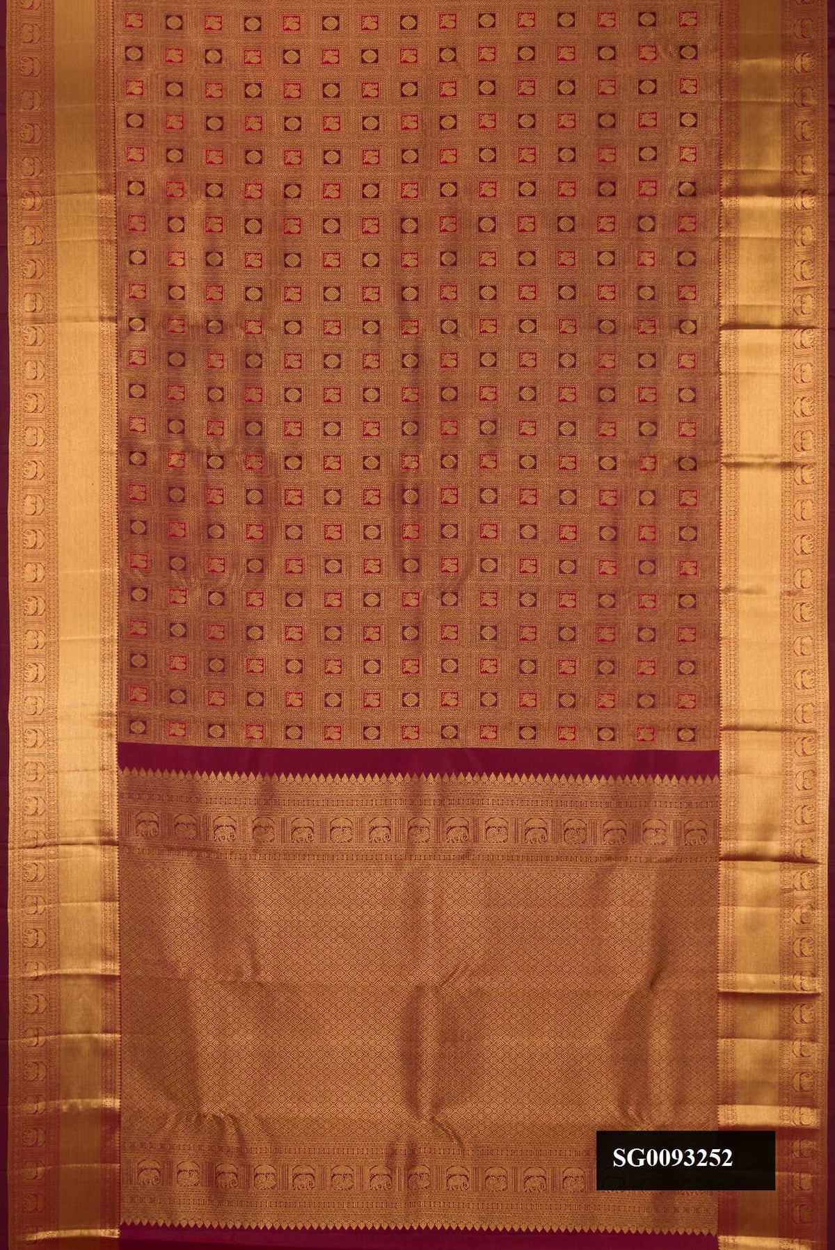 Maroon Dual Tone Kanchipuram Silk Saree with Zari Brocade on the body and Zari Border.  displayed on a mannequin