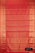 Red Dual Tone Kanchipuram Silk Saree with Stripes on the body and Zari Border.  displayed on a mannequin