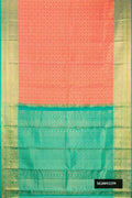 Orange Dual Tone Kanchipuram Silk Saree with Zari Brocade on the body and Fancy Border.  displayed on a mannequin