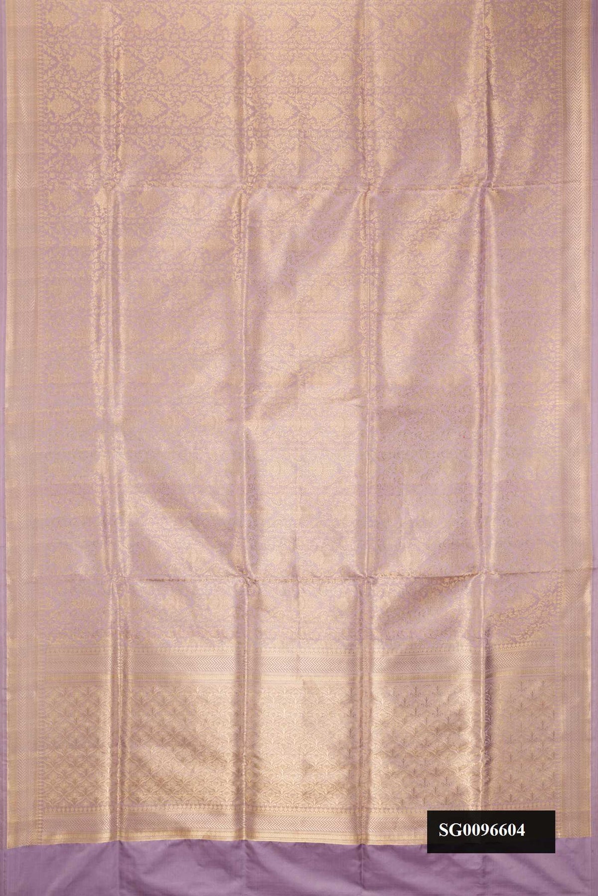 Lavender Dual Tone Banarasi Silk Saree with Zari Brocade on the body and Zari Border.  displayed on a mannequin