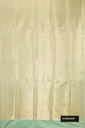 Pista Green Dual Tone Banarasi Silk Saree with Zari Brocade on the body and Zari Border.  displayed on a mannequin