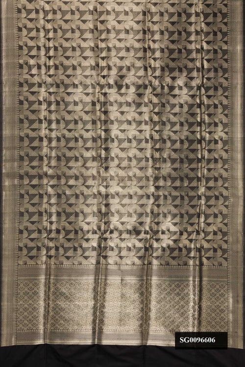 Black Dual Tone Banarasi Silk Saree with Zari Brocade on the body and Zari Border.  displayed on a mannequin