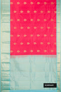 Pink Dual Tone Kanchipuram Silk Saree with Zari Butta on the body and Zari Border.  displayed on a mannequin