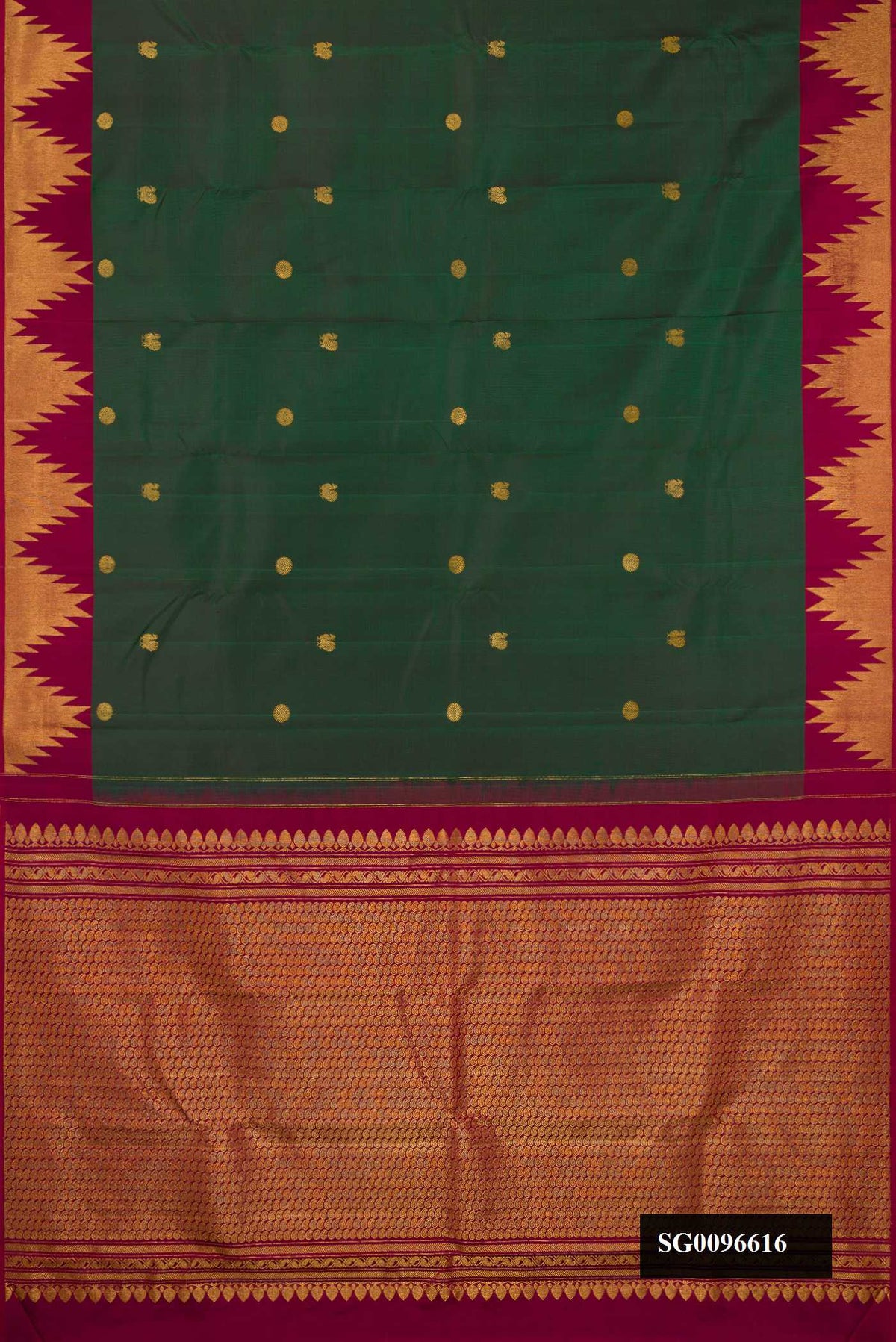 Bottle Green Dual Tone Kanchipuram Silk Saree with Zari Butta on the body and Temple Border.  displayed on a mannequin