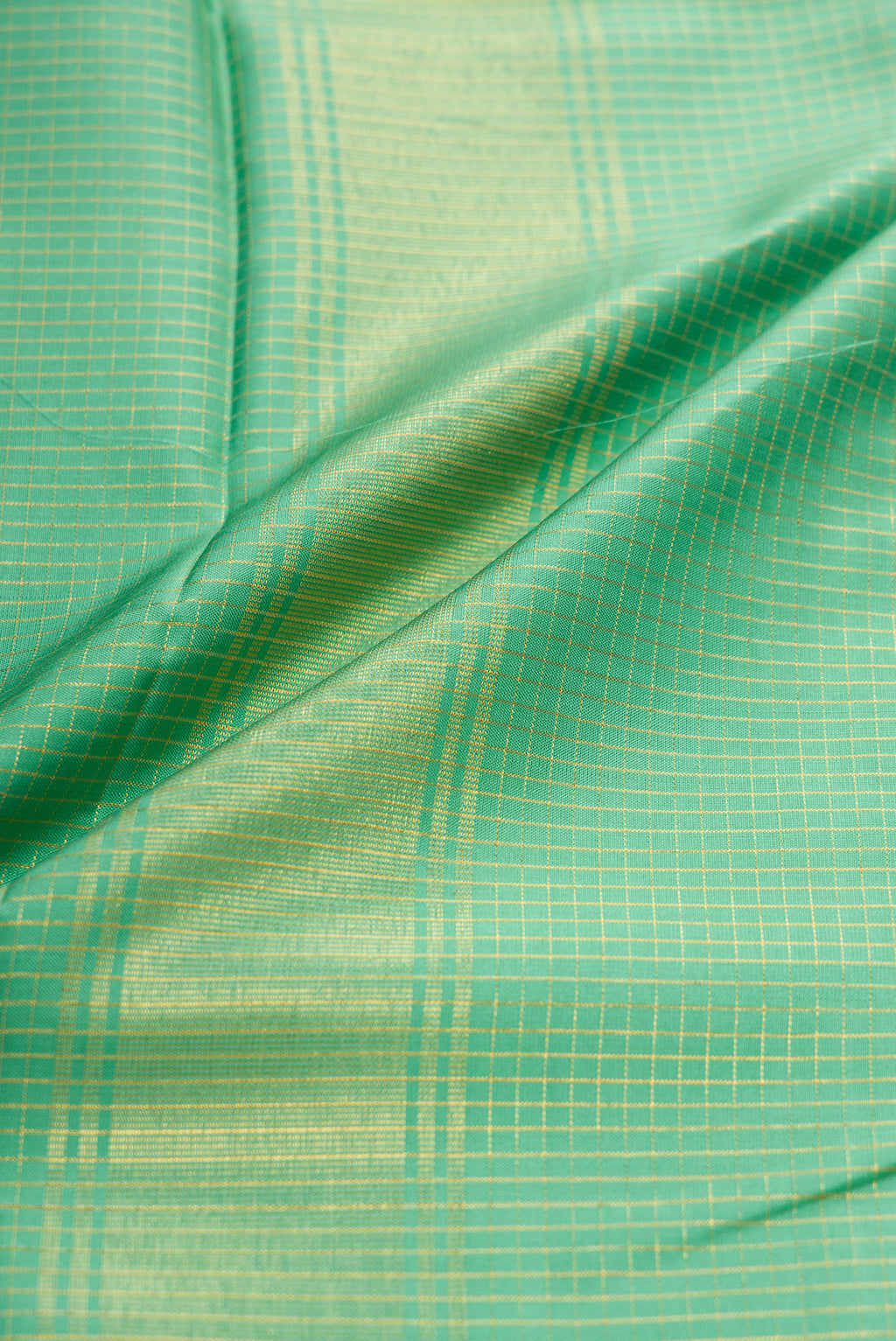 Pista Green Silk Dhoti With Angavastram (9X 5) Muzham with Checked design on the body and Zari Border