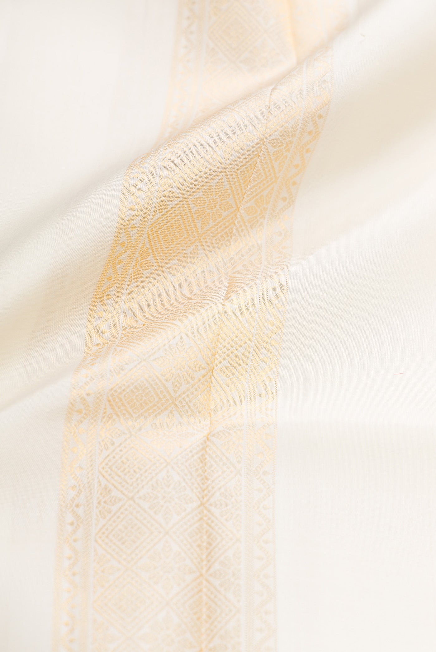 Off White Silk Dhoti With Angavastram (8X4) Muzham with Checked design on the body and Ganga Jamuna Border