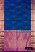Peacock Blue Dual Tone Kanchipuram Silk Saree with Zari Butta on the body and Zari Border.  displayed on a mannequin