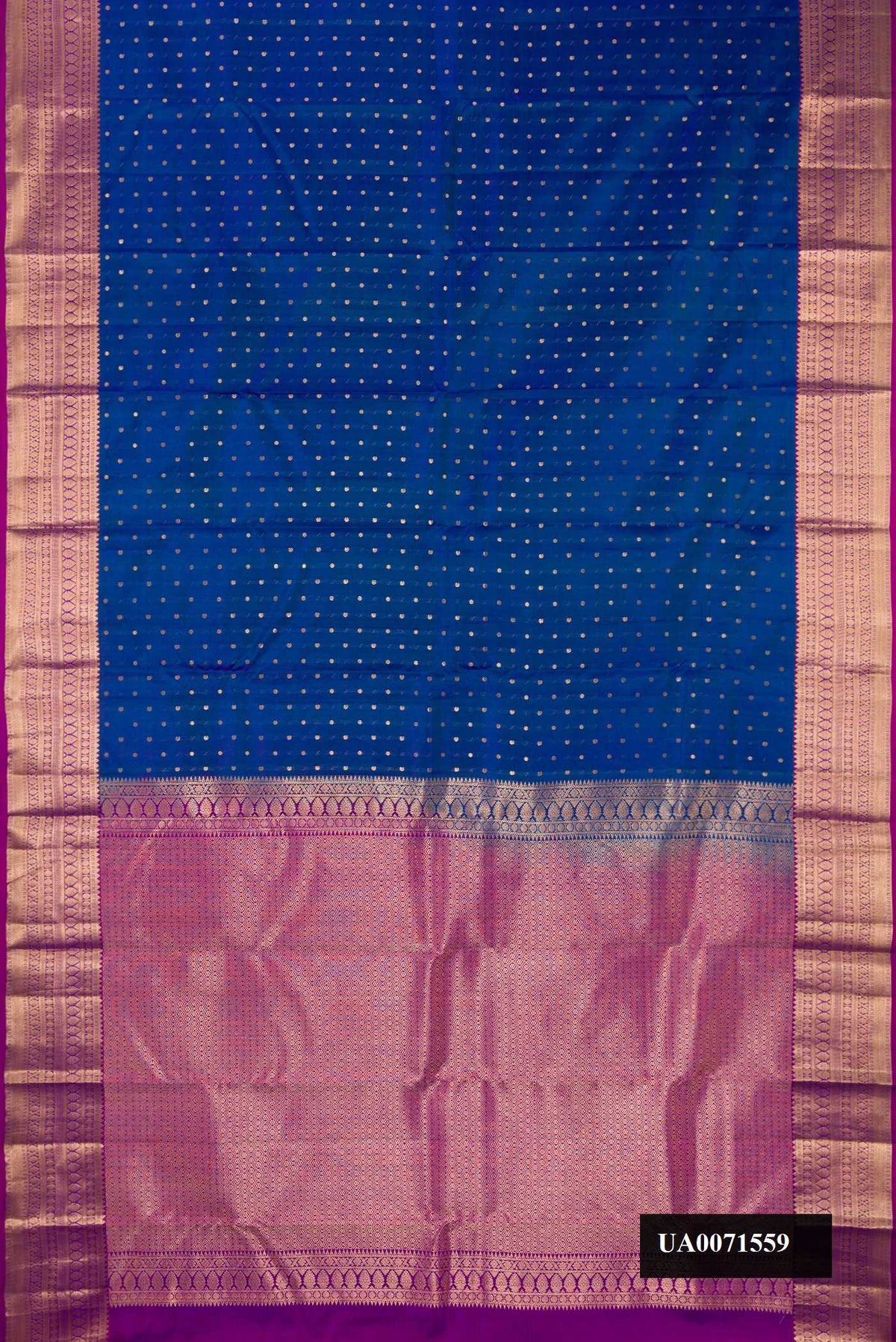 Peacock Blue Dual Tone Kanchipuram Silk Saree with Zari Butta on the body and Zari Border.  displayed on a mannequin