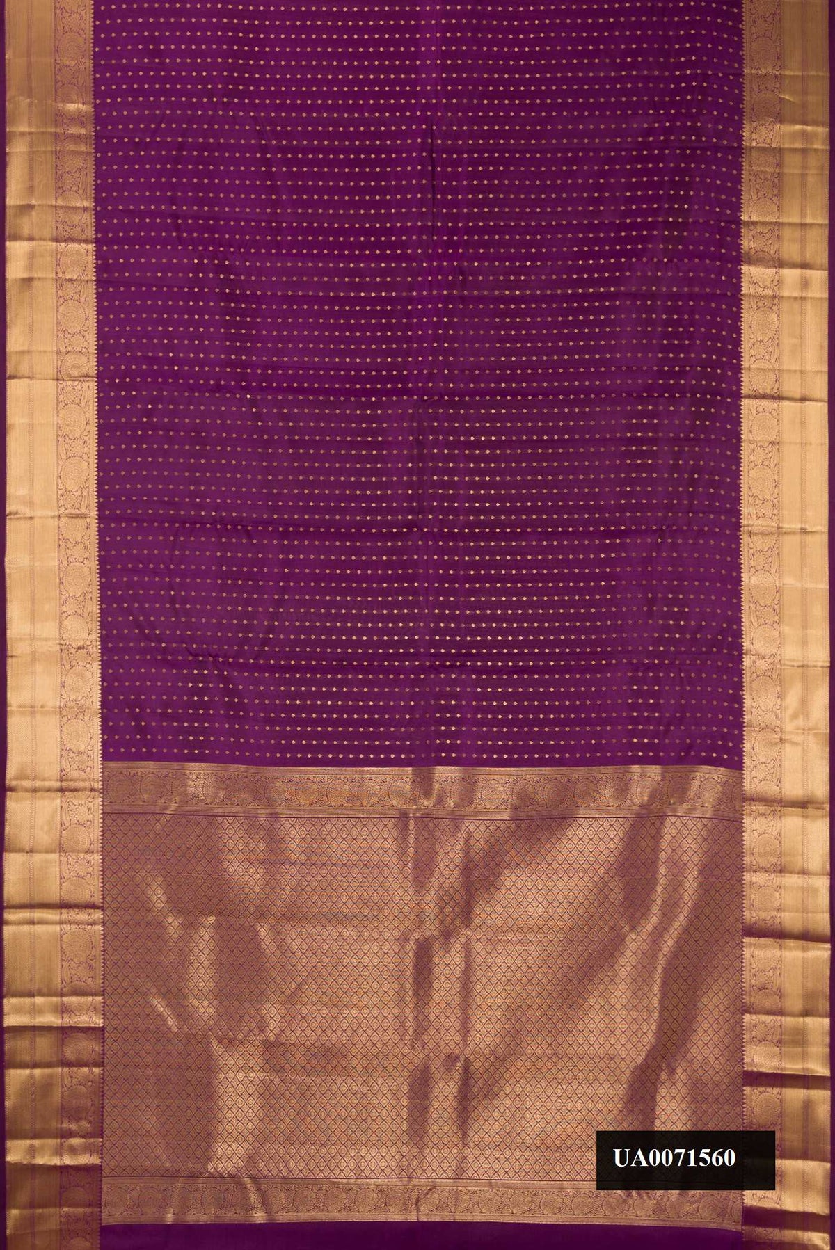 Purple Dual Tone Kanchipuram Silk Saree with Zari Butta on the body and Zari Border.  displayed on a mannequin