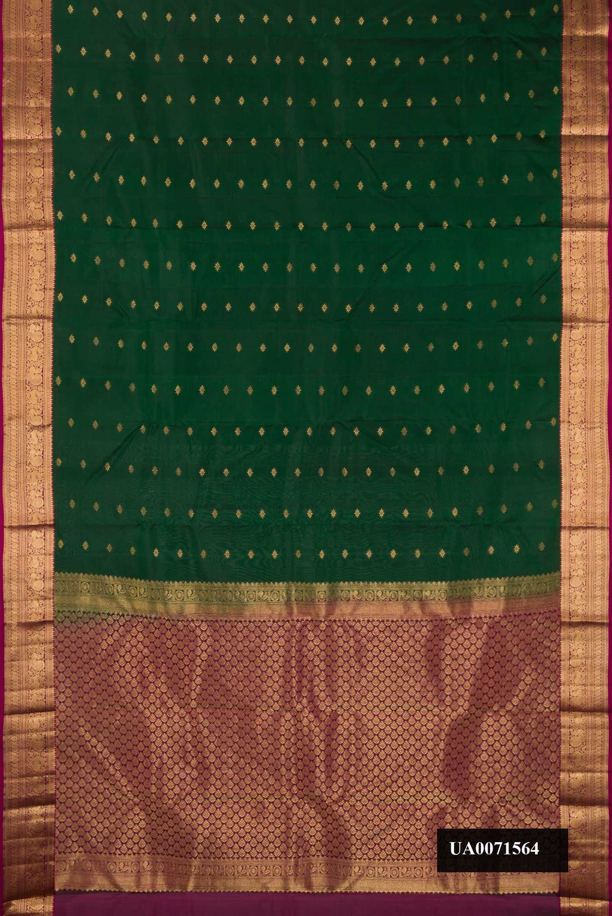 Bottle Green Dual Tone Kanchipuram Silk Saree with Zari Butta on the body and Zari Border.  displayed on a mannequin