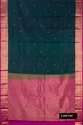 Peacock Blue Dual Tone Kanchipuram Silk Saree with Zari Butta on the body and Zari Border.  displayed on a mannequin
