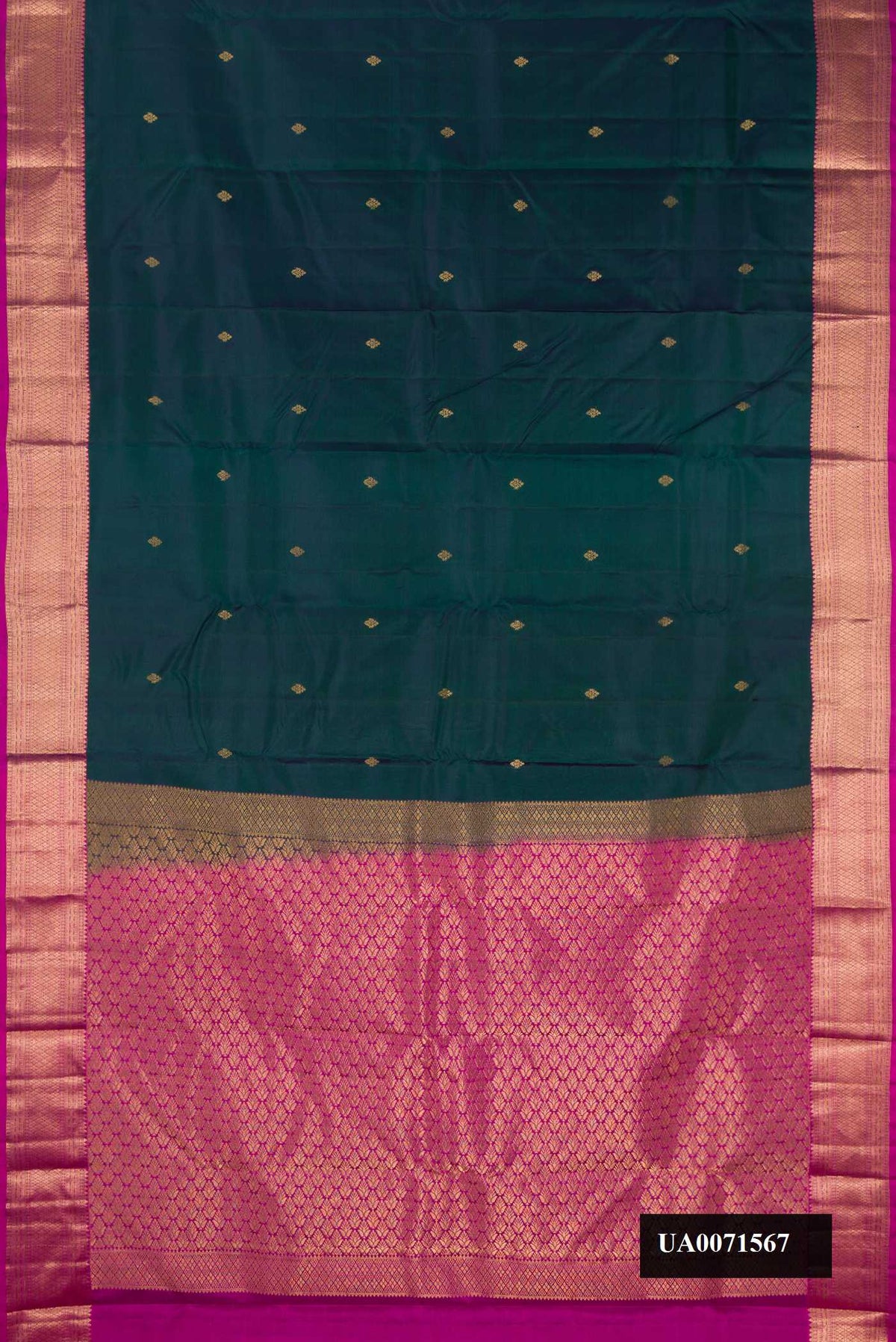 Peacock Blue Dual Tone Kanchipuram Silk Saree with Zari Butta on the body and Zari Border.  displayed on a mannequin