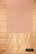 Rose Gold Dual Tone Kanchipuram Silk Saree with Zari Butta on the body and Zari Border.  displayed on a mannequin