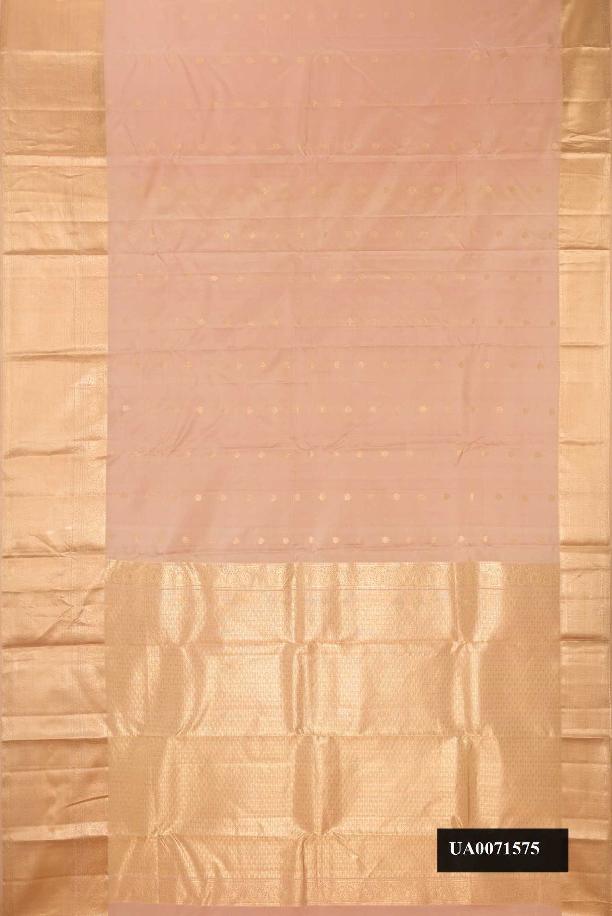 Rose Gold Dual Tone Kanchipuram Silk Saree with Zari Butta on the body and Zari Border.  displayed on a mannequin