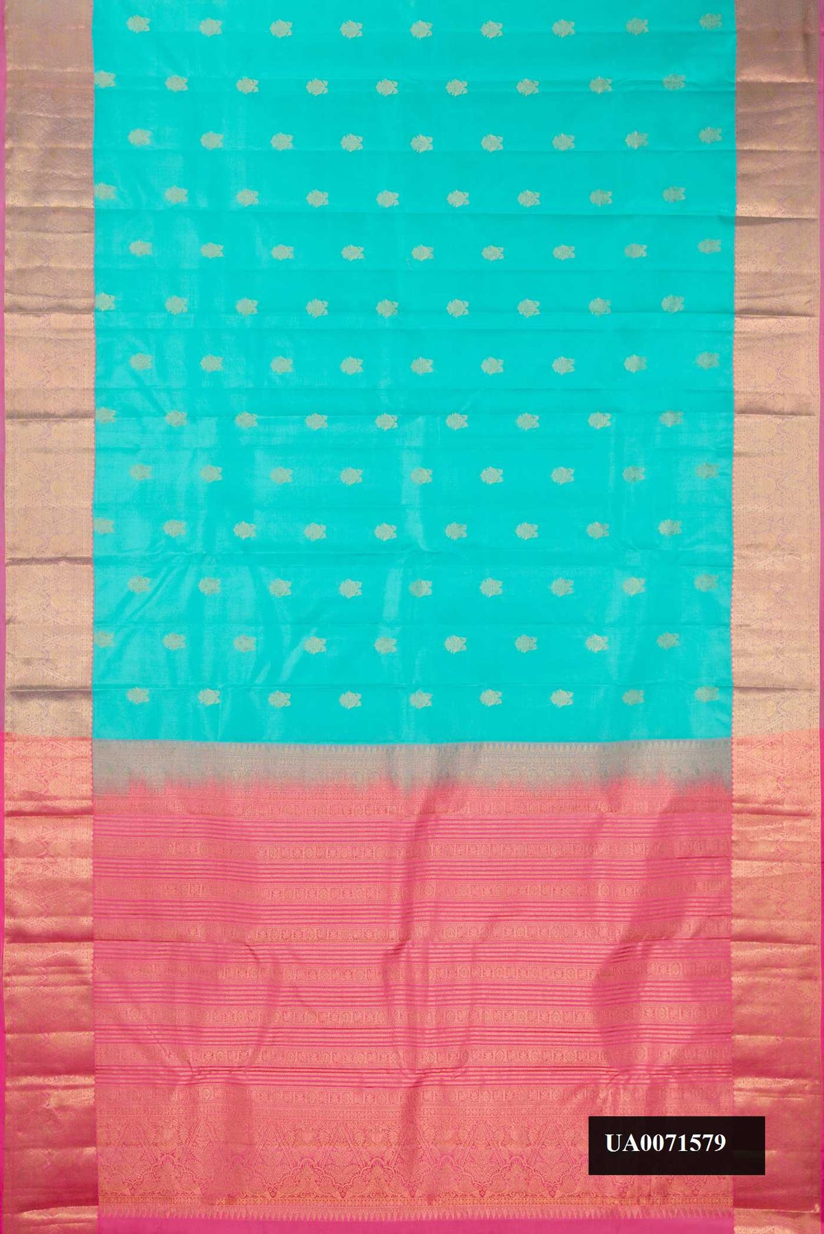 Sky Blue Dual Tone Kanchipuram Silk Saree with Zari Butta on the body and Zari Border.  displayed on a mannequin