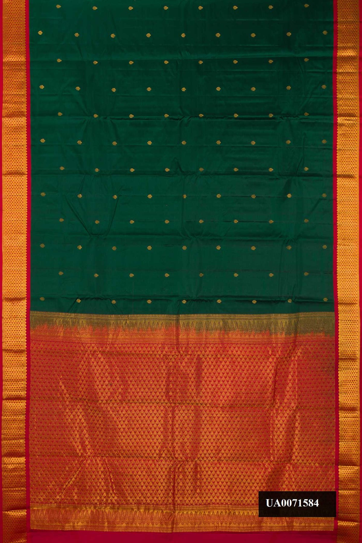 Bottle Green Dual Tone Kanchipuram Silk Saree with Zari Butta on the body and Zari Border.  displayed on a mannequin