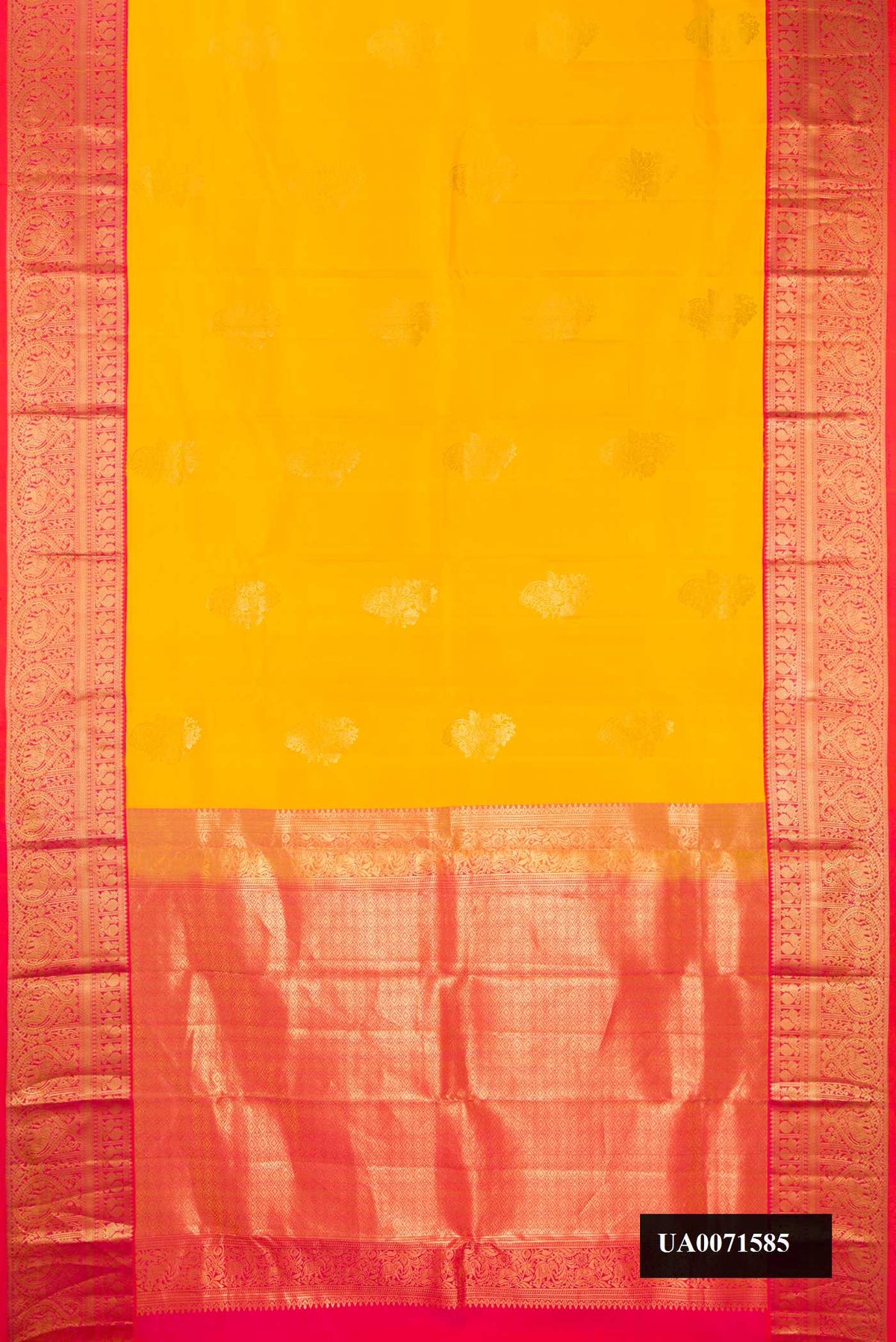 Yellow Dual Tone Kanchipuram Silk Saree with Zari Butta on the body and Zari Border.  displayed on a mannequin