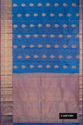 Peacock Blue Dual Tone Kanchipuram Silk Saree with Stripes on the body and Zari Border.  displayed on a mannequin