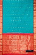 Sky Blue Dual Tone Kanchipuram Silk Saree with Zari Butta on the body and Zari Border.  displayed on a mannequin