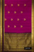 Magenta Dual Tone Kanchipuram Silk Saree with Zari Butta on the body and Zari Border.  displayed on a mannequin