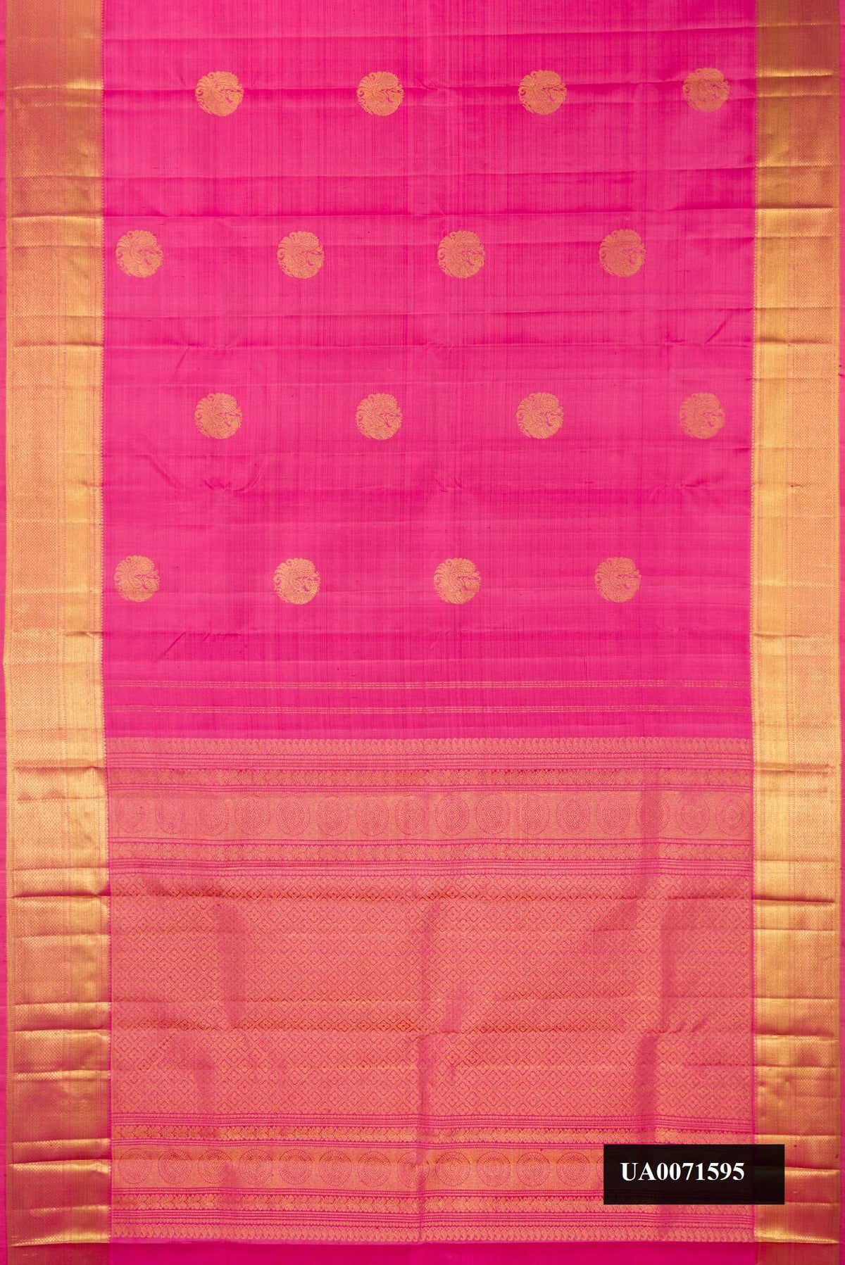 Pink Dual Tone Kanchipuram Silk Saree with Zari Butta on the body and Zari Border.  displayed on a mannequin