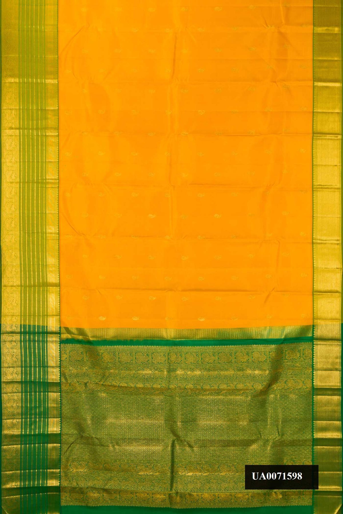 Mustard Dual Tone Kanchipuram Silk Saree with Zari Butta on the body and Zari Border.  displayed on a mannequin