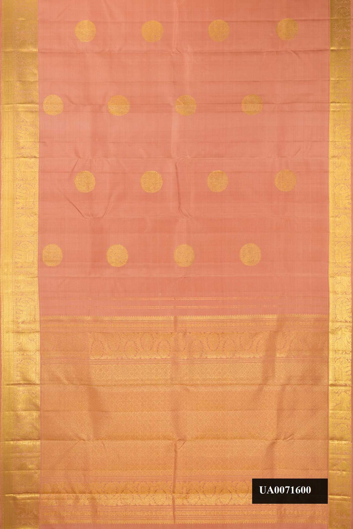 Rose Gold Dual Tone Kanchipuram Silk Saree with Zari Butta on the body and Zari Border.  displayed on a mannequin