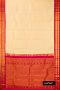 Sandal Dual Tone Kanchipuram Silk Saree with Checked design on the body and Zari Border.  displayed on a mannequin