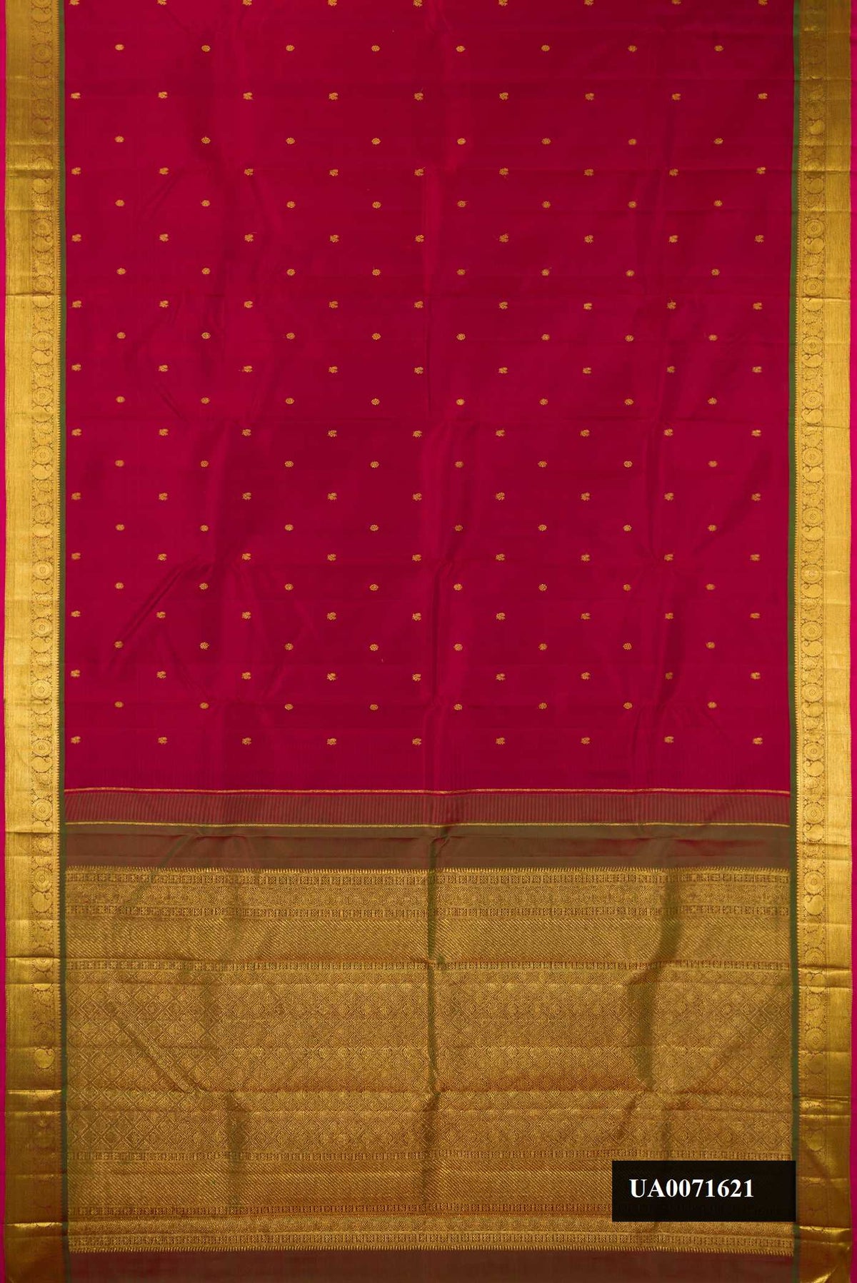 Maroon Dual Tone Kanchipuram Silk Saree with Zari Butta on the body and Zari Border.  displayed on a mannequin