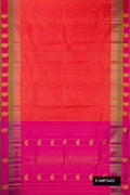 Coral Dual Tone Kanchipuram Silk Saree with Checked design on the body and Fancy Border.  displayed on a mannequin