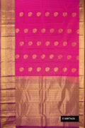 Pink Dual Tone Kanchipuram Silk Saree with Checked design on the body and Zari Border.  displayed on a mannequin