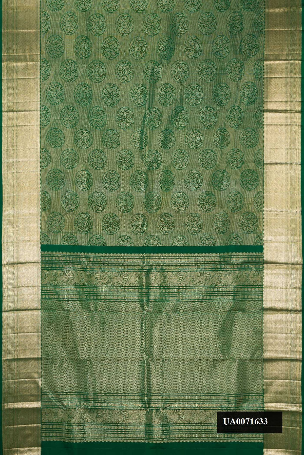 Bottle Green Dual Tone Kanchipuram Silk Saree with Zari Brocade on the body and Zari Border.  displayed on a mannequin
