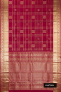 Maroon Dual Tone Kanchipuram Silk Saree with Checked design on the body and Zari Border.  displayed on a mannequin