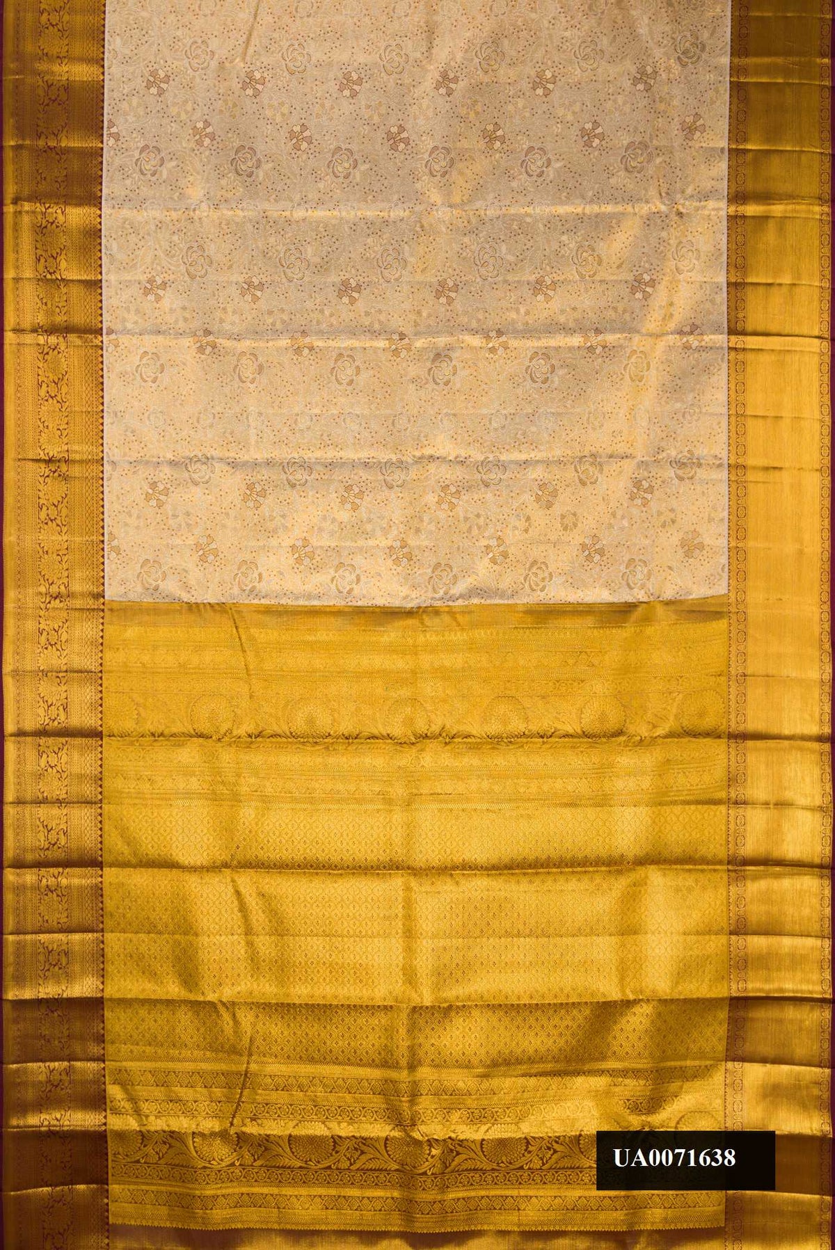 Beige Dual Tone Kanchipuram Tissue Silk Saree with Zari Brocade on the body and Zari Border.  displayed on a mannequin