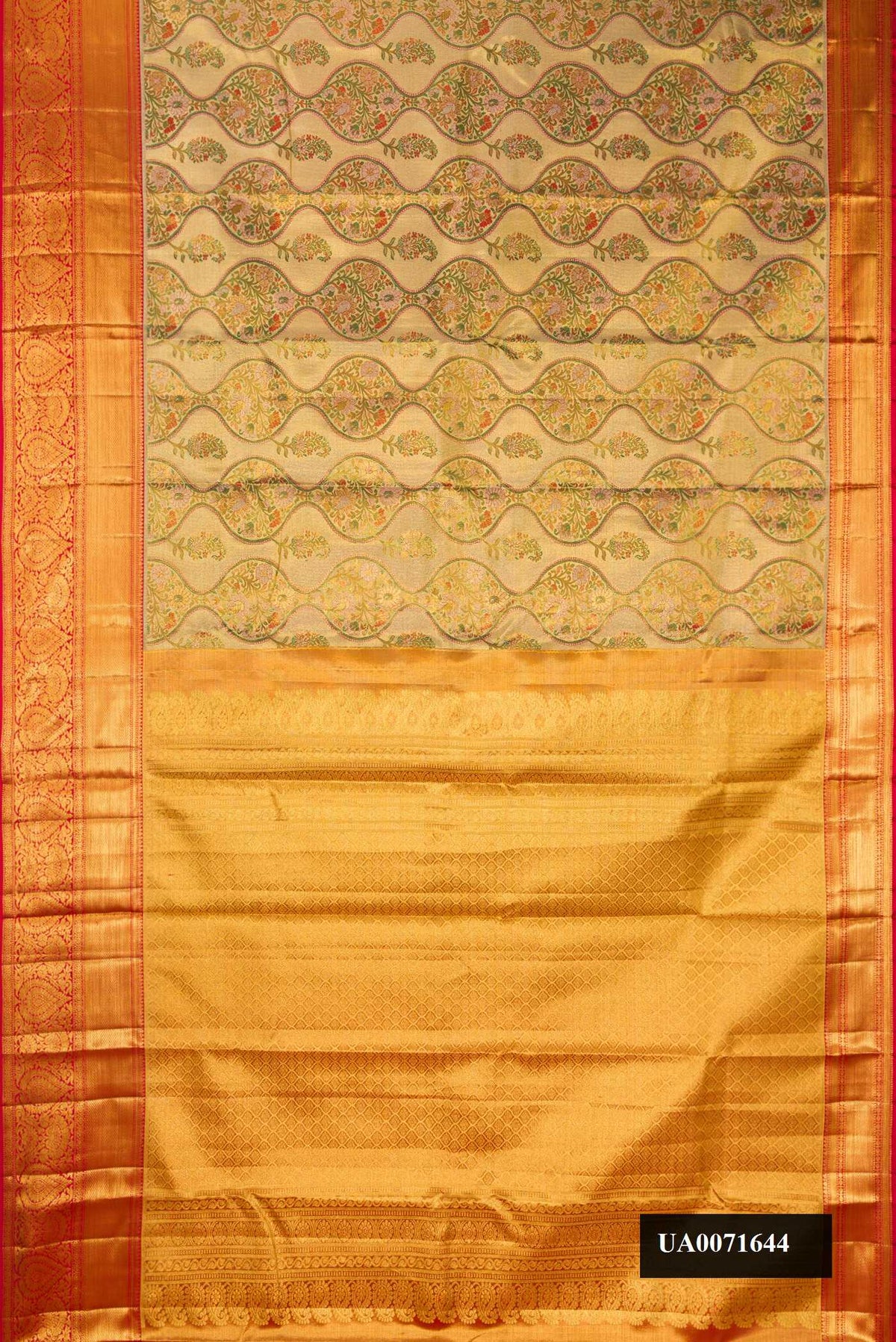 Gold Dual Tone Kanchipuram Tissue Silk Saree with Zari Brocade on the body and Zari Border.  displayed on a mannequin