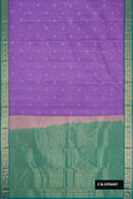 Lavender Dual Tone Kanchipuram Silk Saree with Zari Butta on the body and Zari Border.  displayed on a mannequin