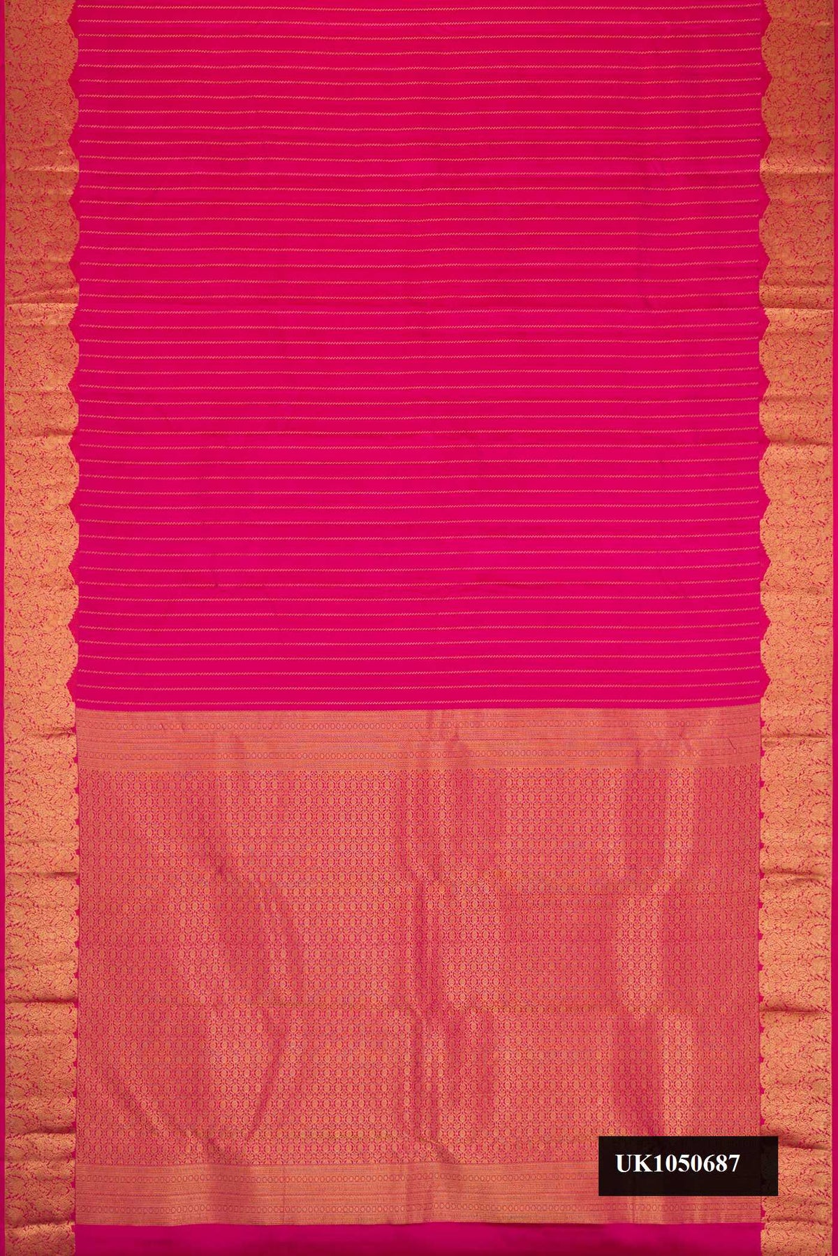 Pink Dual Tone Kanchipuram Silk Saree with Stripes on the body and Fancy Border.  displayed on a mannequin