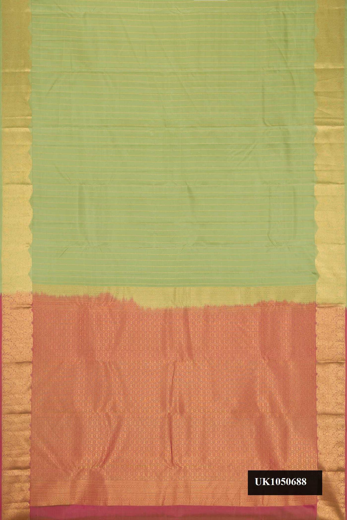 Pista Green Dual Tone Kanchipuram Silk Saree with Stripes on the body and Fancy Border.  displayed on a mannequin