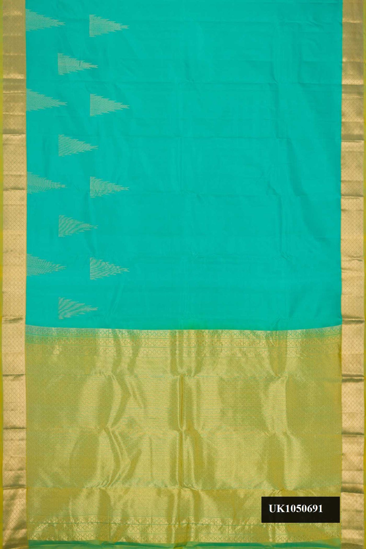 Sea Green Dual Tone Kanchipuram Silk Saree with Plain Body and Temple Border.  displayed on a mannequin