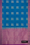 Peacock Blue Dual Tone Kanchipuram Silk Saree with Zari Butta on the body and Zari Border.  displayed on a mannequin