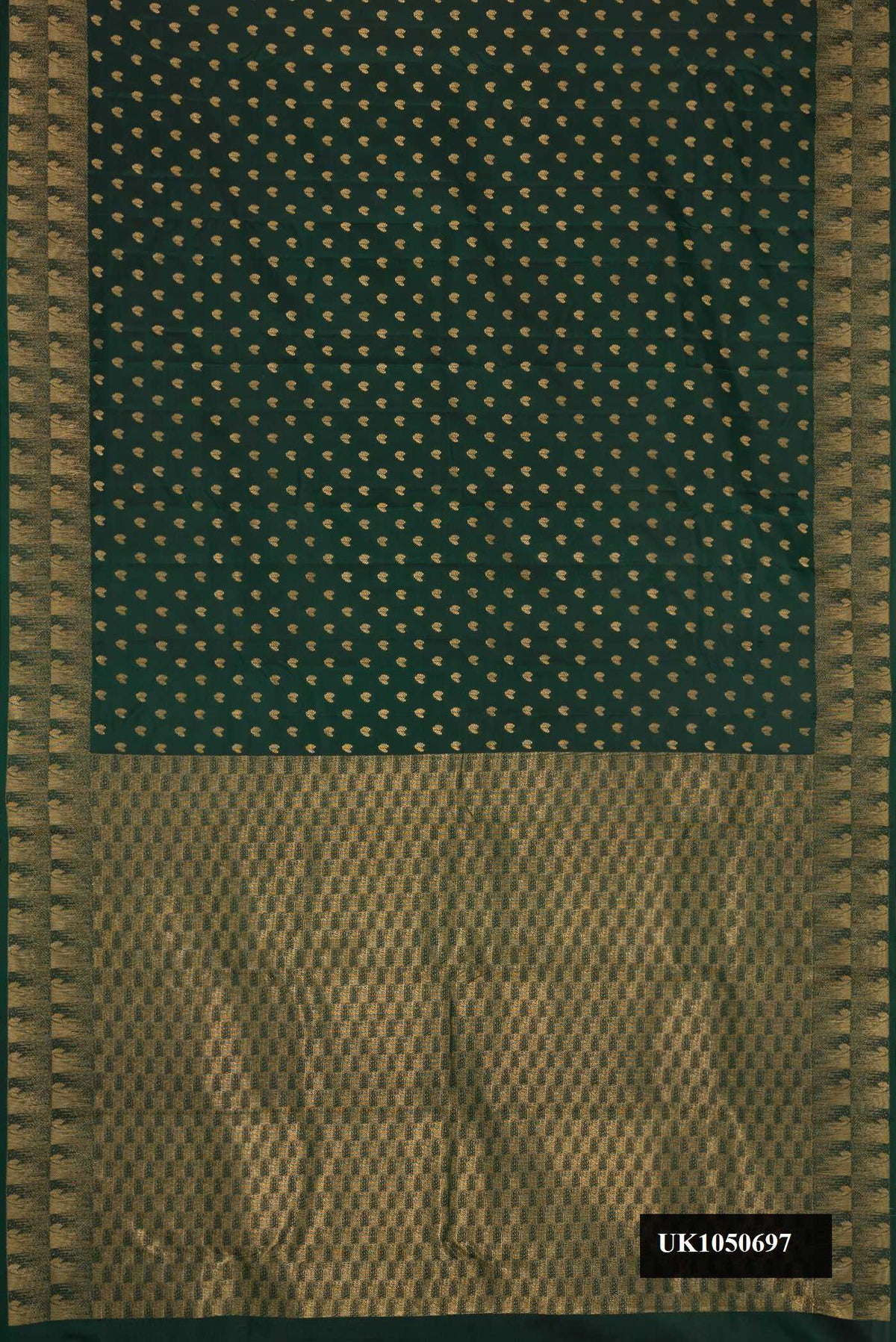 Bottle Green Dual Tone Kanchipuram Silk Saree with Zari Butta on the body and Zari Border.  displayed on a mannequin