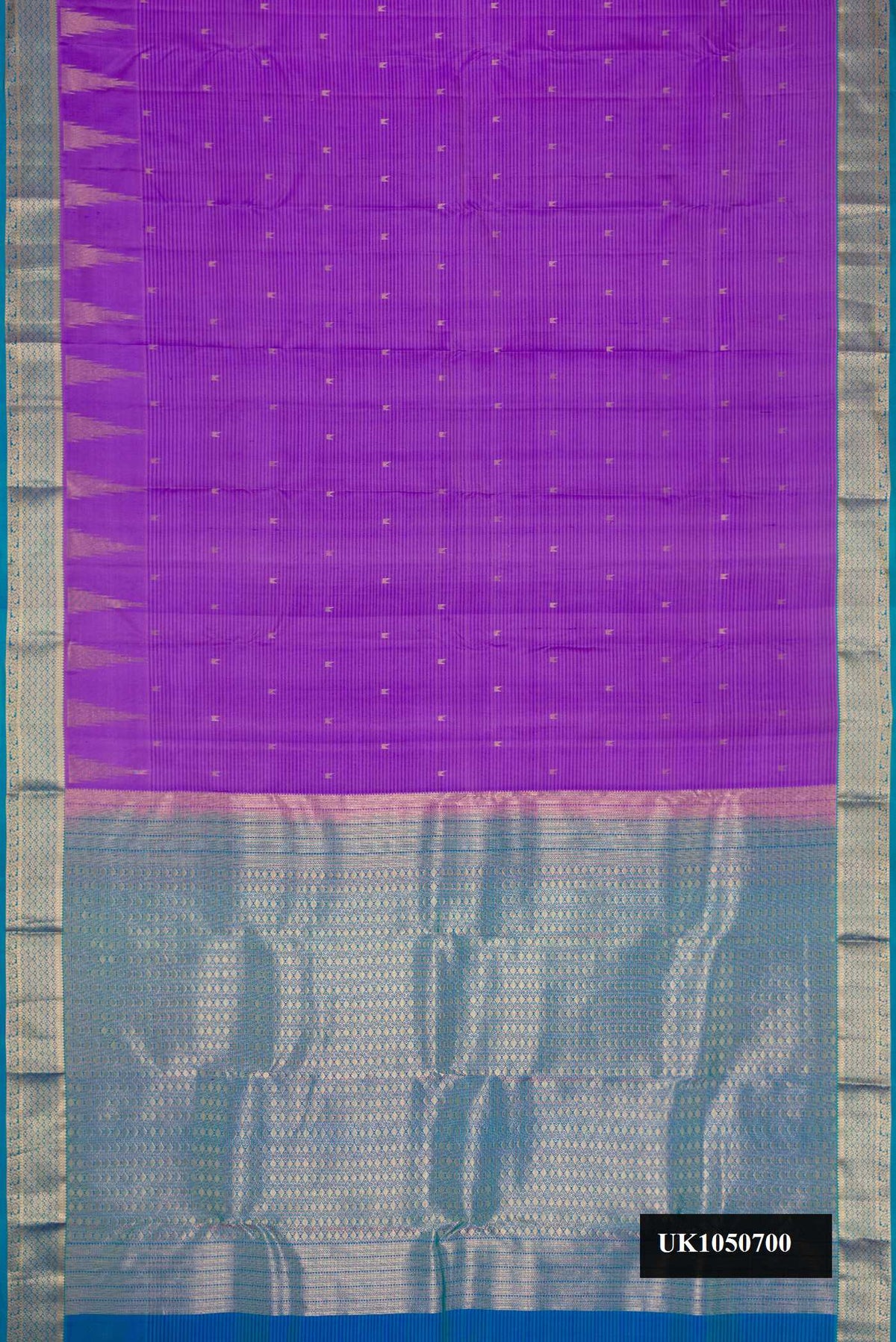 Lavender Dual Tone Kanchipuram Silk Saree with Zari Butta on the body and Zari Border.  displayed on a mannequin