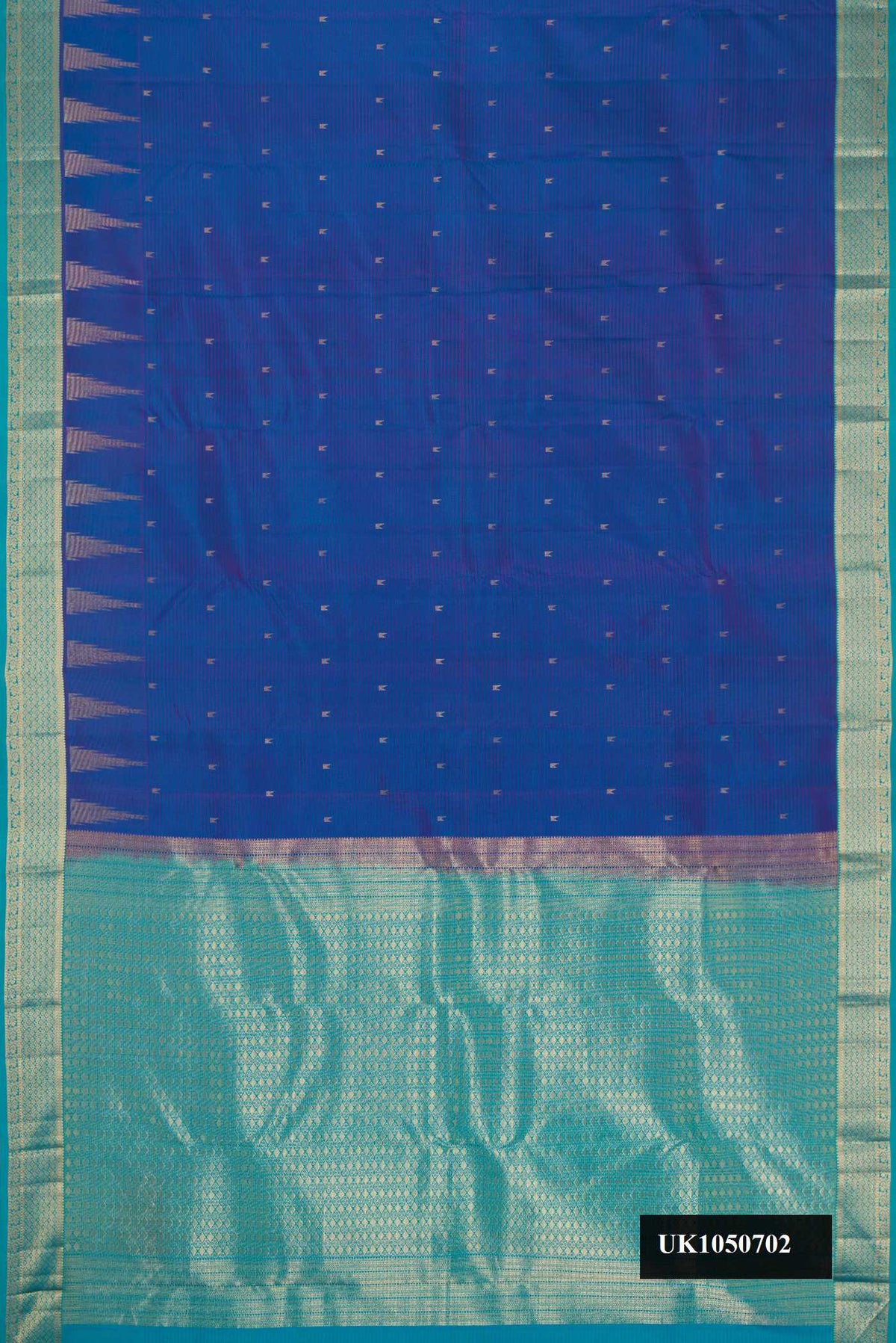 Royal Blue Dual Tone Kanchipuram Silk Saree with Zari Butta on the body and Temple Border.  displayed on a mannequin
