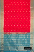 Red Dual Tone Kanchipuram Silk Saree with Zari Butta on the body and Zari Border.  displayed on a mannequin