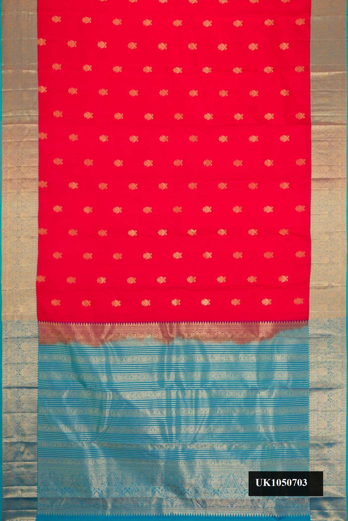 Red Dual Tone Kanchipuram Silk Saree with Zari Butta on the body and Zari Border.  displayed on a mannequin