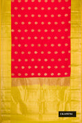 Red Dual Tone Kanchipuram Silk Saree with Zari Butta on the body and Zari Border.  displayed on a mannequin